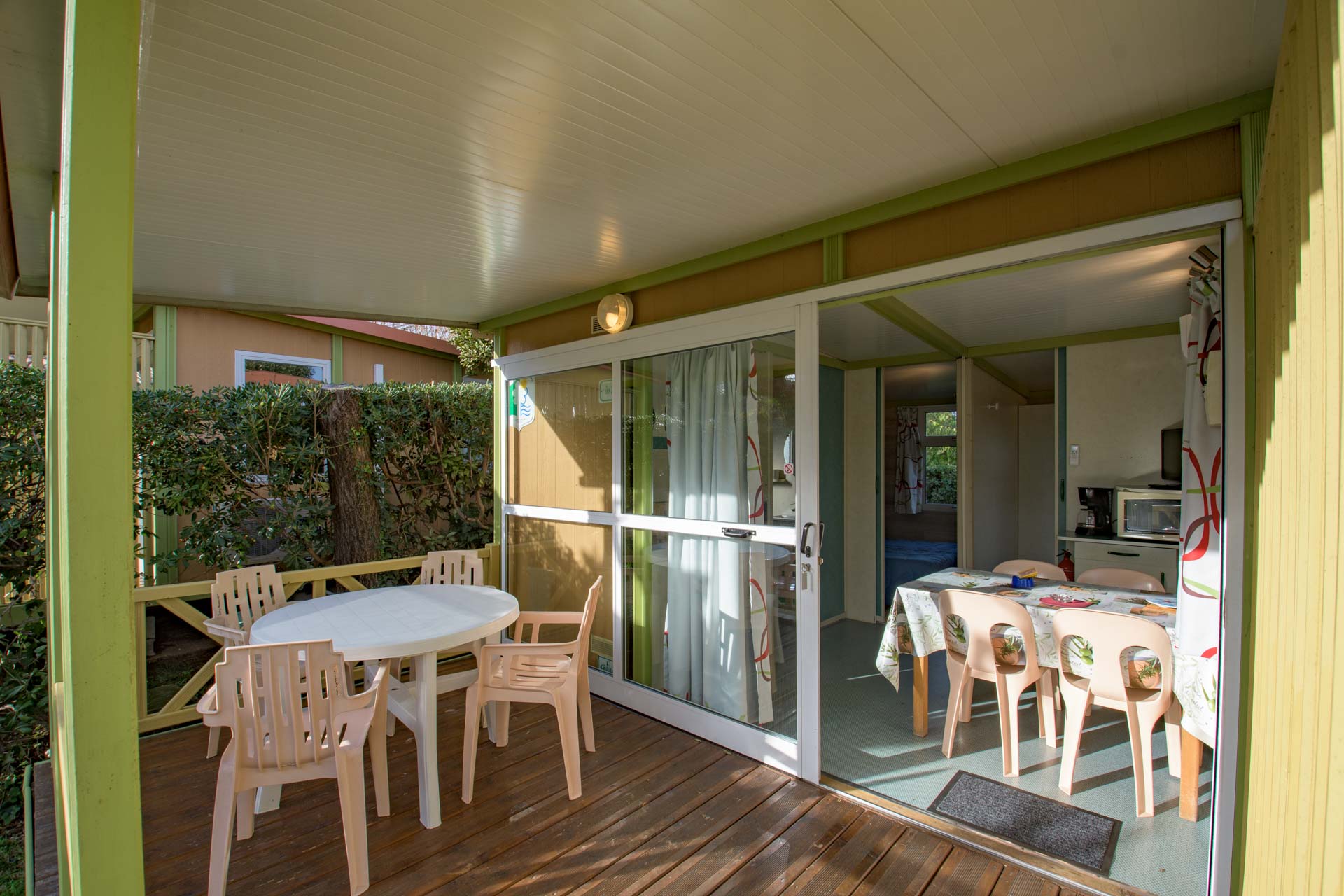 Location - Chalet Ilo 19 M² / 2 Chambres - Climatisation / Terrasse Couverte - Camping LA VIEILLE FERME