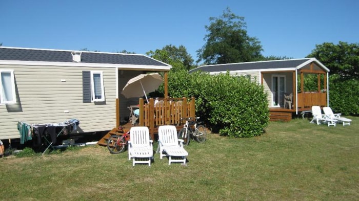Mobil-Home 2 Chambres 24M² Modèle Panama 2012 + Terrasse Couverte 9M² (2 Modèles Sur Le Camping)