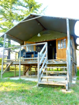 Location - Lodge Acadienne / 2 Chambres / Clim - Terrasse Couverte - Camping Quercy Vacances ****