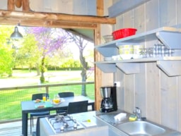 Location - Lodge Acadienne / 2 Chambres / Clim - Terrasse Couverte - Camping Quercy Vacances ****