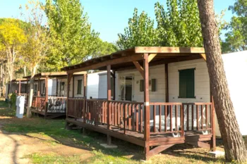 Mietunterkunft - Mobilheim Deluxe - Camping Village Punta Navaccia Mietunterkunft - Mobilheim Deluxe - Camping Village Punta Navaccia