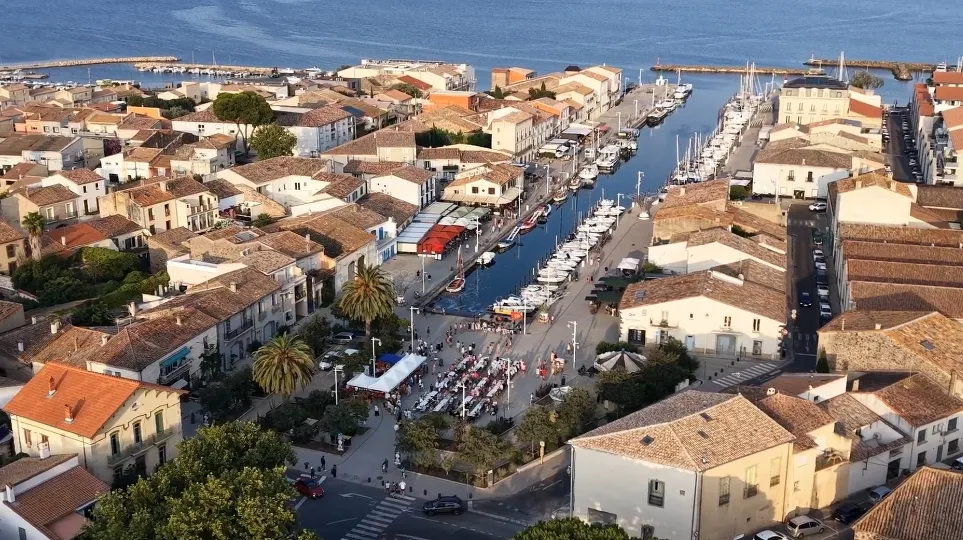 Aerial view of Marseillan harbour during summer events