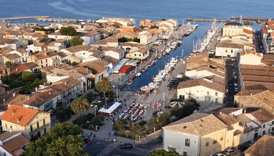 Aerial view of Marseillan harbour during summer events