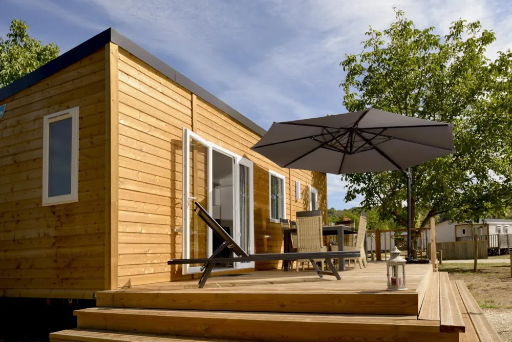 Mobilhome de madera Premium 30m² 2 habitaciones con Terraza semi-cubierta + TV + Sábanas