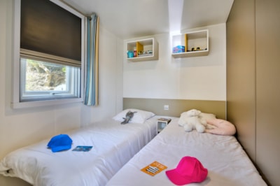 Mobil-Home Comfort 30m² 2 bedrooms + half-covered terrace + TV + AIR CONDITIONING