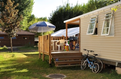 Mobil-Home Standard 31m² 3 bedrooms with half-covered terrace 7m² + TV