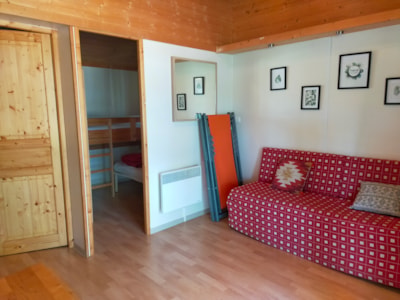 Chalet overlooking the swimming pool and the playground
