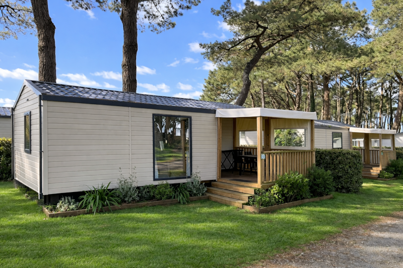 Mobil home Confort - 25m² - 2 chambres - terrasse couverte côté