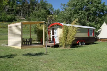 Mietunterkunft - Planwagen 21M² 1 Zimmer + Halbüberdachte Terrasse - Flower Camping La Beaume