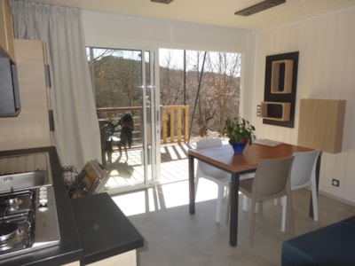 Chalet 32m² PREMIUM - 2 bedrooms + semi-covered terrace + TV + dishwasher + air conditioning