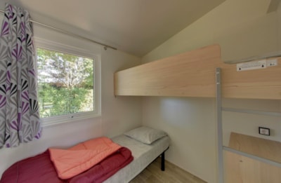 TITHOME (our low cost) 2 bedrooms without bathroom, halfway between cabin and mobile home