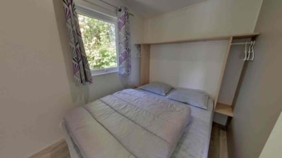 TITHOME (our low cost) 2 bedrooms without bathroom, halfway between cabin and mobile home