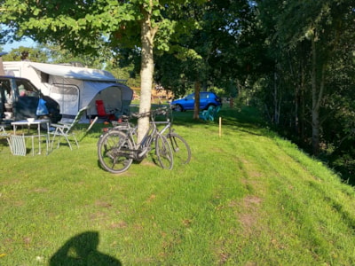 Bare pitch 100m² (electricity included) — 3
