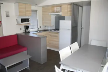 Mietunterkunft - Mobilheim 3 Schlafzimmer / Confort  (Clim + Pergola + Plancha + Tv) - Camping La Tour de France***