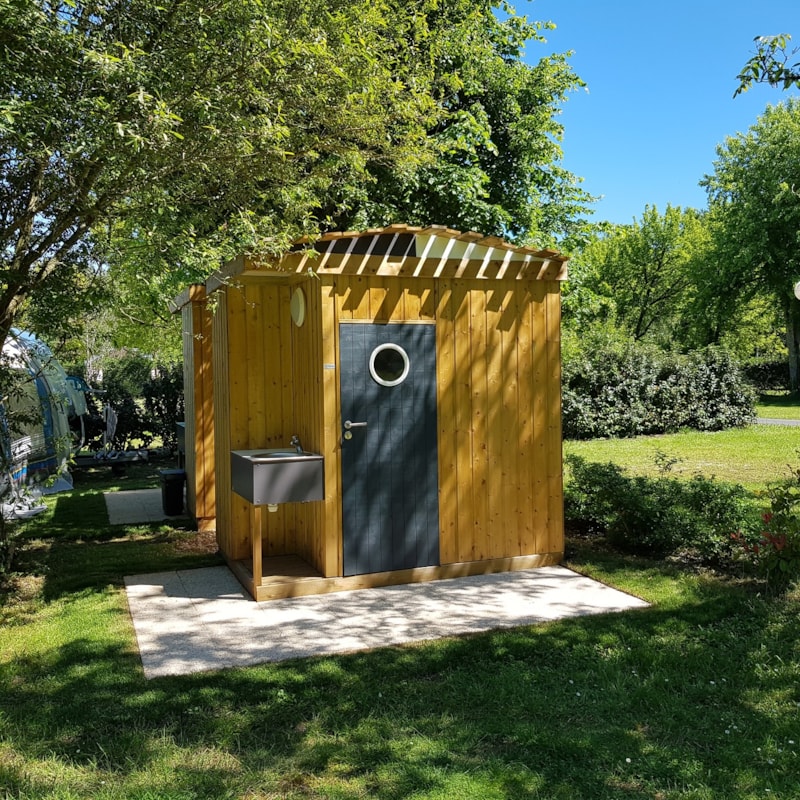 Kampeerplaats met individueel sanitair