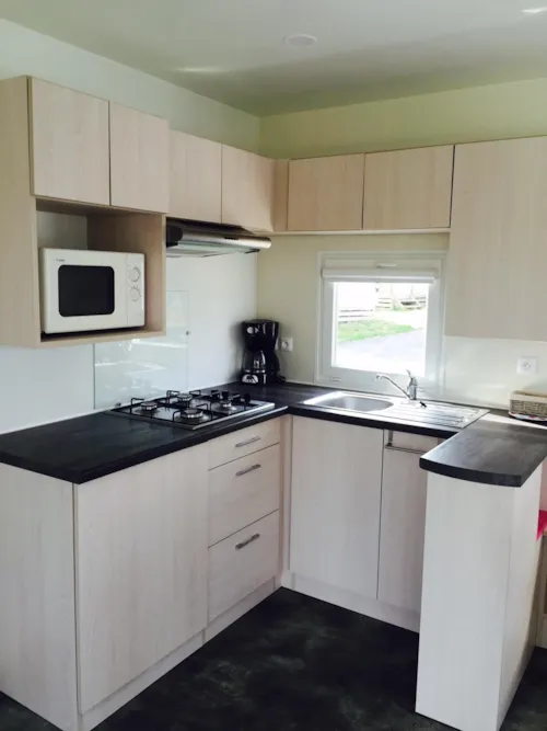 Mietunterkunft - Mobil-Home Premium 2 Schlafzimmer - Klimaanlage+ Spa - image n°5 - Camping Le Petit Bois Sites et Paysages
