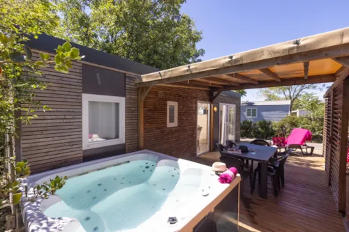 Huuraccommodatie(s) - Mobil-Home Premium 3  Slaapkamers - Airconditioning + Spa - image n°4 - Camping Le Petit Bois Sites et Paysages