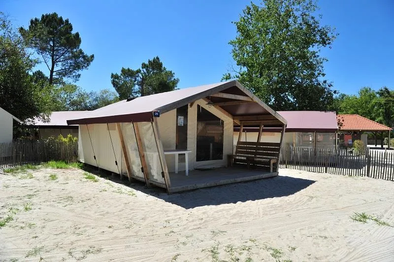 Location - Tente Bois/Toile Nature Confort 30M² - 2 Chambres + Terrasse Couverte + Evier - Sans Sanitaire - Camping Paradis Le Tastesoule