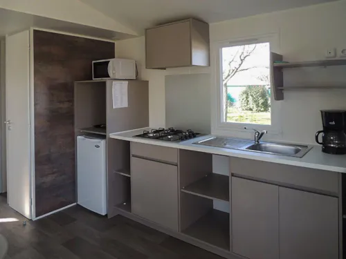 Mietunterkunft - Mobilheim Trigano 33 M² - 2 Schlafzimmer - image n°2 - Camping BEAUME GIRAUD