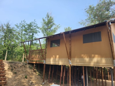 Glamping Lodge PREMIUM RIVER 27m² - 2 bedrooms - TV - A/C - covered terrace - river view -
