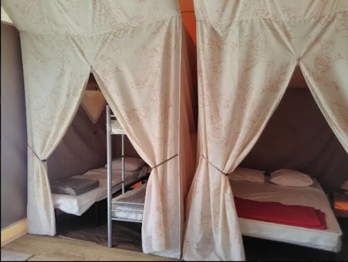 Location - Bungalow Toilé 2 Chambres - image n°2 - Camping Du Bois De La Dame
