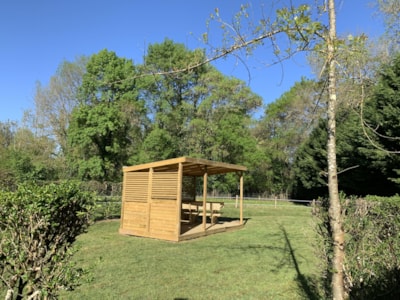 Premium pitch with river view + covered terrace — 5