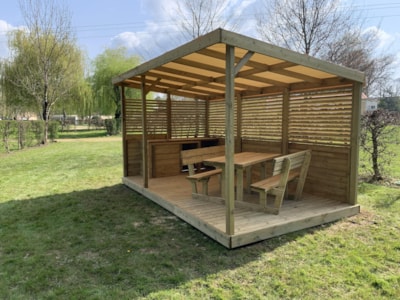 Premium pitch with river view + covered terrace — 1