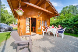 Mietunterkunft - Chalet  Confort Alpina 28 M² (1 Zimmer + 1 Zimmer Zwischengeschoss ) + Holzofen - Flower Camping du Lac de la Seigneurie