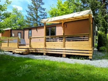 Mietunterkunft - Cottage Ohara Côté Jardin Premium -  36M² - 3 Schlafzimmer + Halbüberdachte Terrasse - Flower Camping du Lac de la Seigneurie