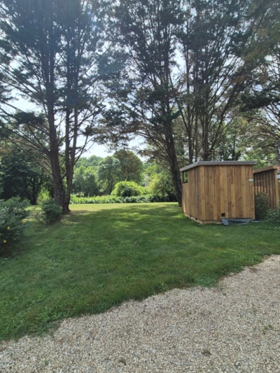 Premium pitch for tents, caravans and motorhomes with private bathroom facilities and kitchen area