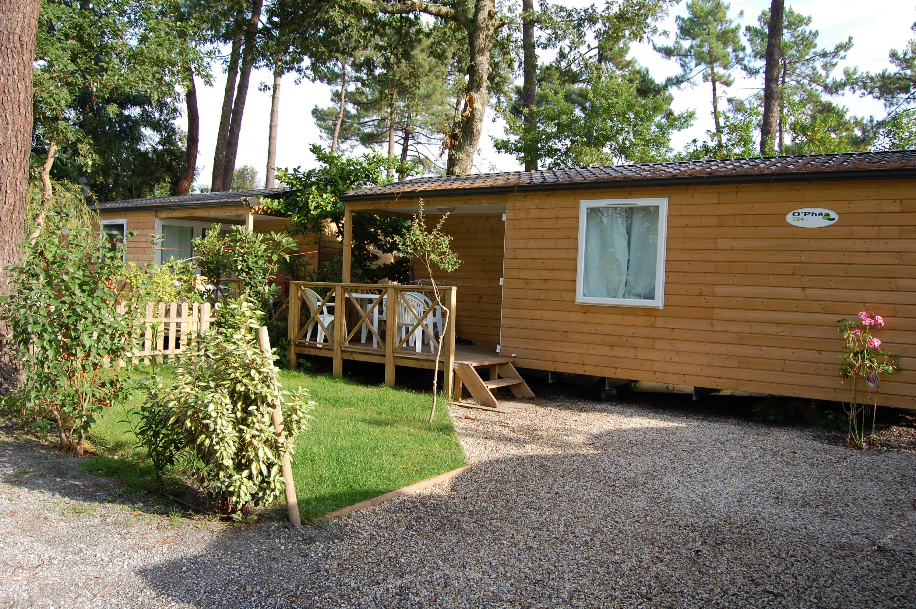 Mobil-Home Grand Confort 30M² - Modèle 2 Terrasse Intégrée Semi-Couverte - Emplacement Voiture Privé Mobil-Home Grand Confort 30M² - Modèle 2 Terrasse Intégrée Semi-Couverte - Emplacement Voiture Privé