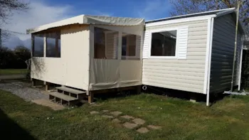Mietunterkunft - Mobilheim  Confort +  2 Zimmer - Überdachte Terrasse - Domaine de la Baie Dorée