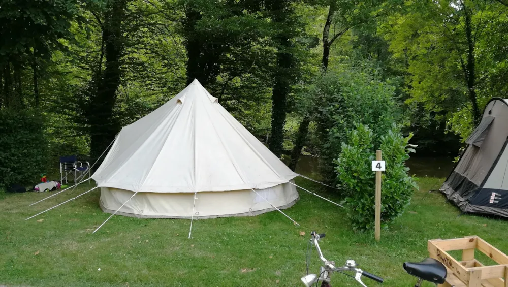 Pitch tent or caravan