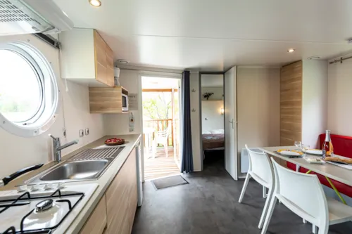 Mietunterkunft - Mobilheim Loggia - 2 Schlafzimmer - Integrierte Terrasse - image n°5 - Village Nature Zen