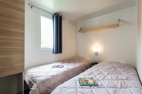 Mietunterkunft - Mobilheim Loggia - 2 Schlafzimmer - Integrierte Terrasse - image n°7 - Village Nature Zen