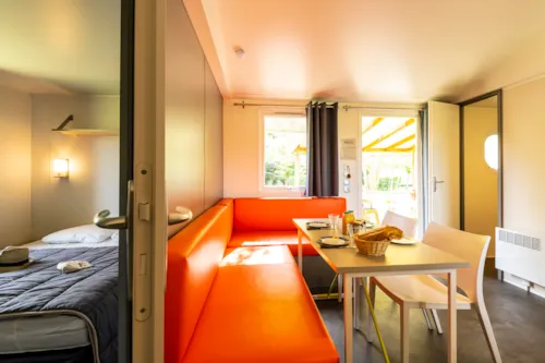 Mietunterkunft - Mobilheim Standard - 2 Zimmer - Überdachte Terrasse - image n°5 - Village Nature Zen