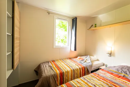 Mietunterkunft - Mobilheim Standard - 2 Zimmer - Überdachte Terrasse - image n°6 - Village Nature Zen