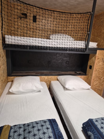 Glamping wooden hut under Saharan canvas