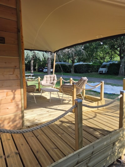 Glamping wooden hut under Saharan canvas