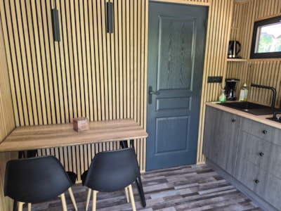 Glamping wooden hut under Saharan canvas