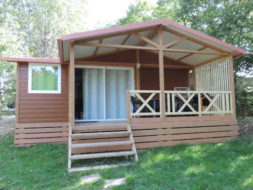 Location - Chalet Essentiel 32 M² / 3 Chambres  / Tv / Terrasse Couverte 12 M² - image n°2 - Camping d'Arpheuilles