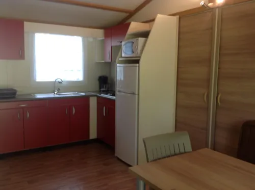 Location - Chalet Essentiel 32 M² / 3 Chambres  / Tv / Terrasse Couverte 12 M² - image n°5 - Camping d'Arpheuilles