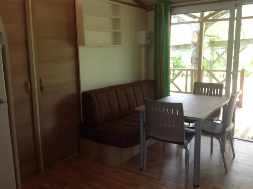 Location - Chalet Essentiel 32 M² / 3 Chambres  / Tv / Terrasse Couverte 12 M² - image n°4 - Camping d'Arpheuilles