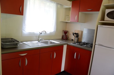 Air-conditioned chalet / 32m2 / 3 bedrooms / TV / 12 m² covered terrace