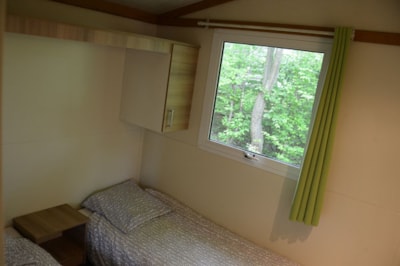 Air-conditioned chalet / 32m2 / 3 bedrooms / TV / 12 m² covered terrace