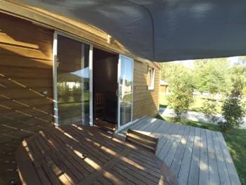 Location - Chalet Isard - 2 Chambres - Camping Les Chalets du Lac Belcaire ****