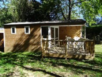 Location - Chalet Marmotte - 2 Chambres - Camping Les Chalets du Lac Belcaire ****
