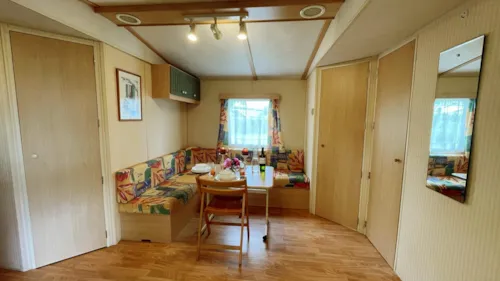 Mietunterkunft - Mobilhome Cottage Comfort 2 Bedrooms Covered Terrace - image n°4 - Camping de la Belle Etoile