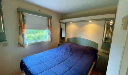 Mietunterkunft - Mobilhome Cottage Comfort 2 Bedrooms Covered Terrace - image n°5 - Camping de la Belle Etoile