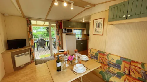 Mietunterkunft - Mobilhome Cottage Comfort 2 Bedrooms Covered Terrace - image n°6 - Camping de la Belle Etoile
